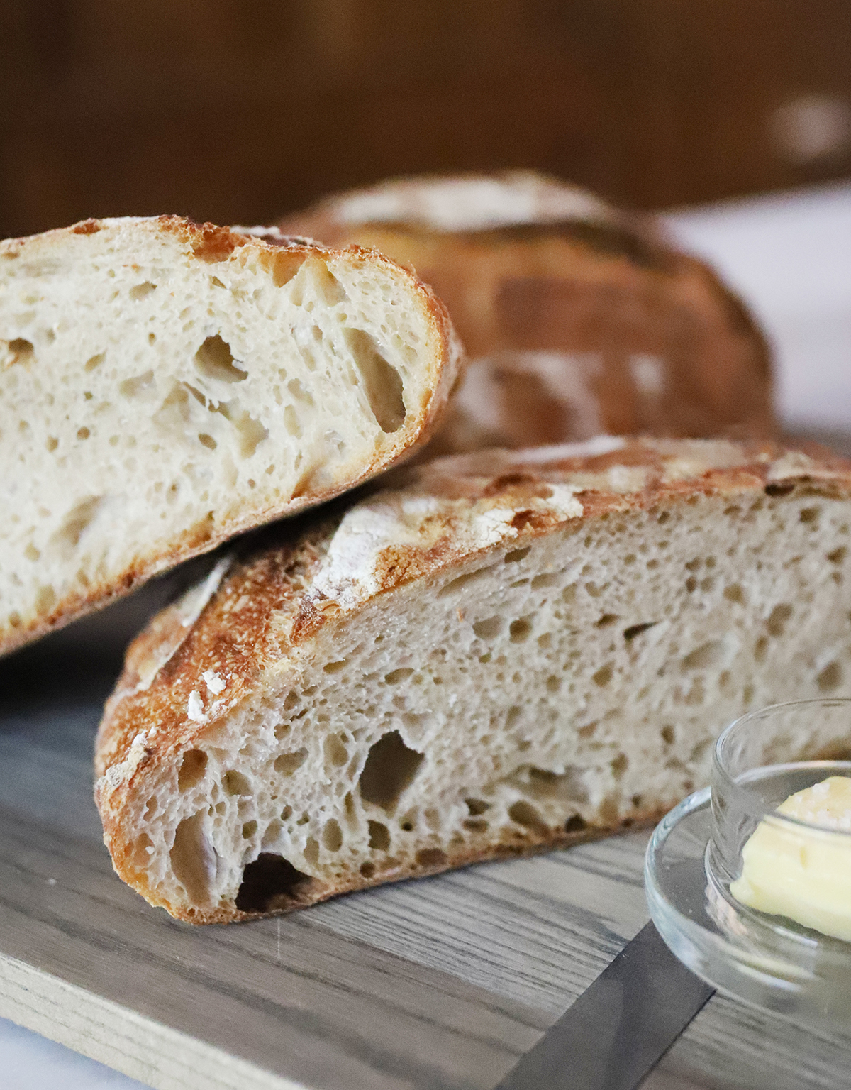 image of sliced sourdough bread with butter